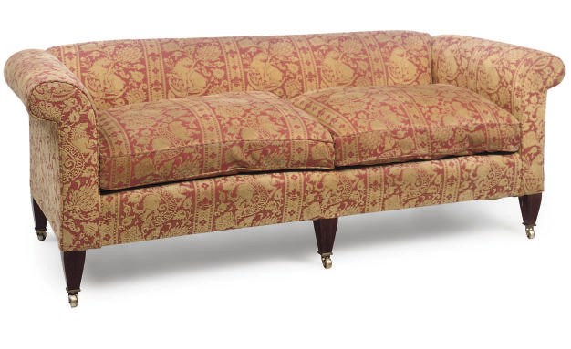 A GOLD AND RED BROCADE UPHOLSTERED SOFA