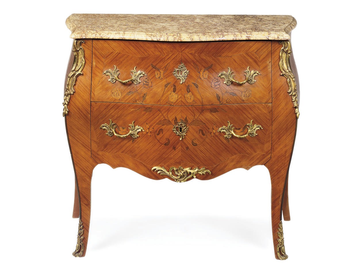 A GILT METAL MOUNTED KINGWOOD BOMBE COMMODE