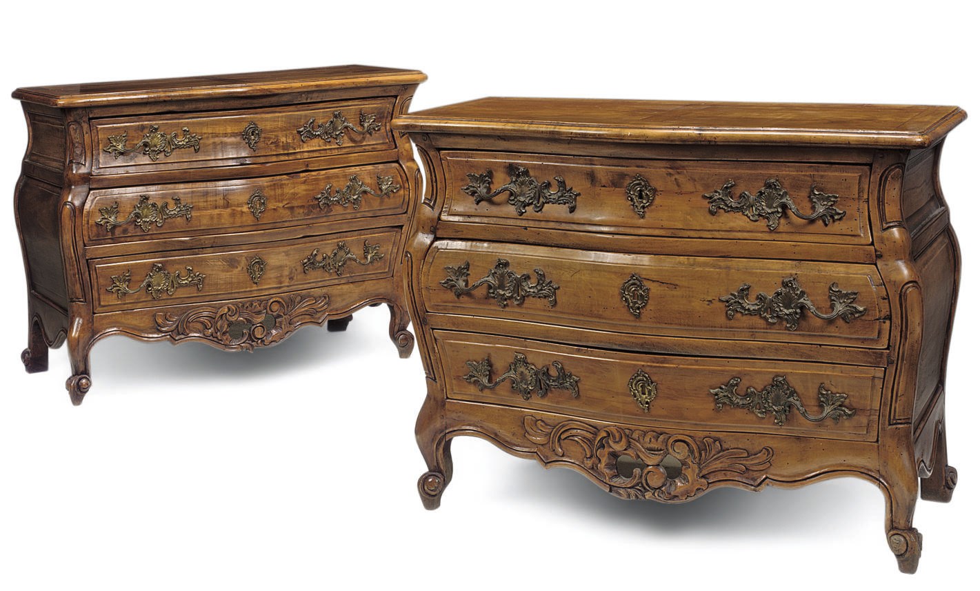 A PAIR OF FRENCH FRUITWOOD BOMBE COMMODES