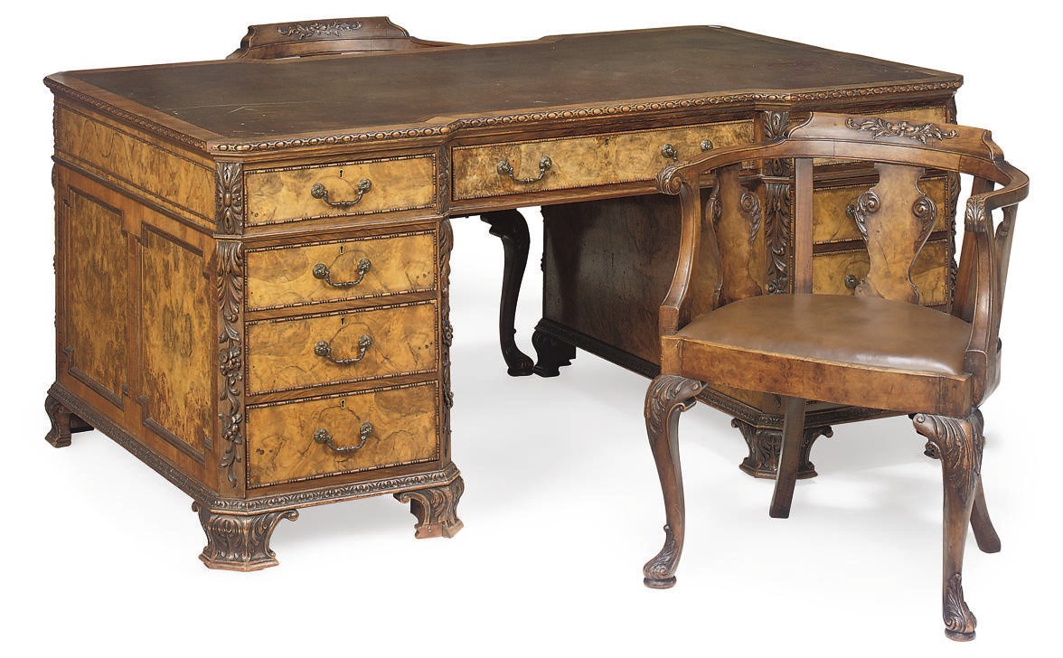 A WALNUT PEDESTAL PARTNER'S DESK