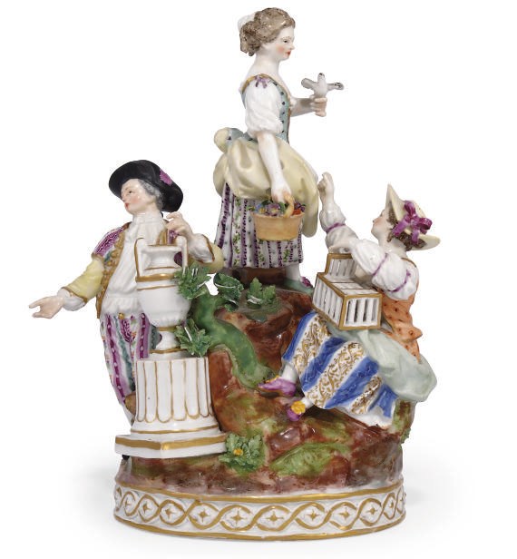 A GERMAN PORCELAIN FIGURE GROUP AND A MEISSEN FIGURE OF A LADY