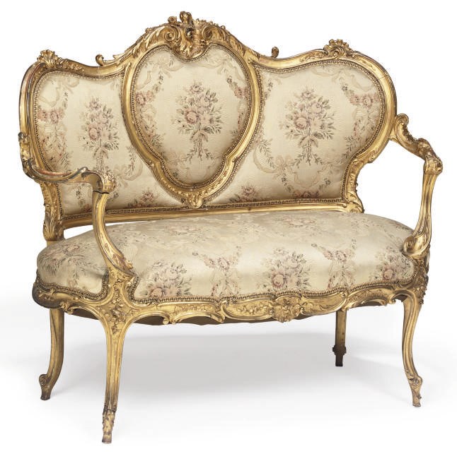 A CARVED GILTWOOD CANAPE