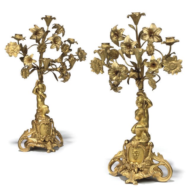 A PAIR OF GILT-BRONZE FIVE-LIGHT CANDELABRA