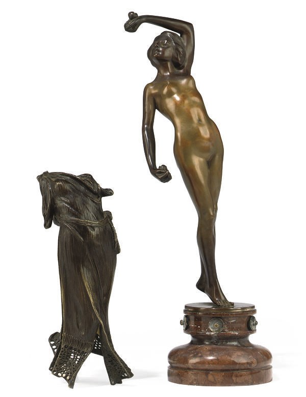 AN AUSTRIAN BRONZE MODEL OF A DANCING LADY