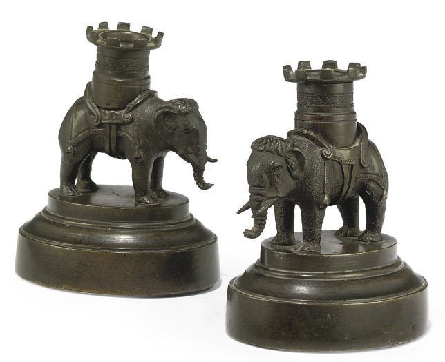 A PAIR OF REGENCY BRONZE CANDLESTICKS