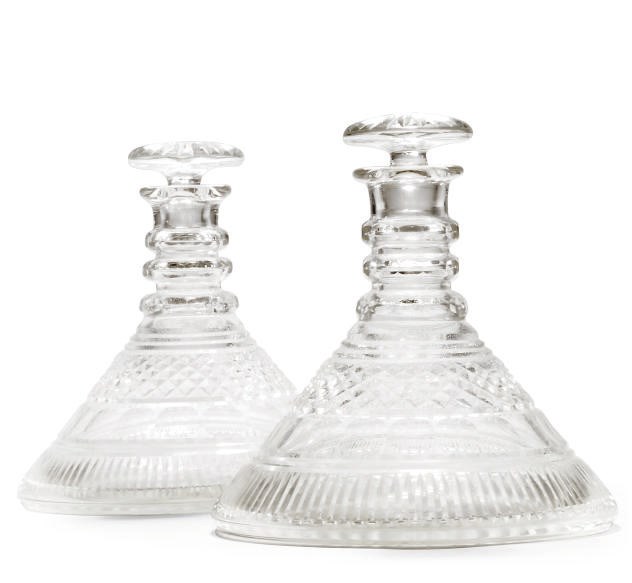 A PAIR OF CUT-GLASS SHIPS DECANTERS