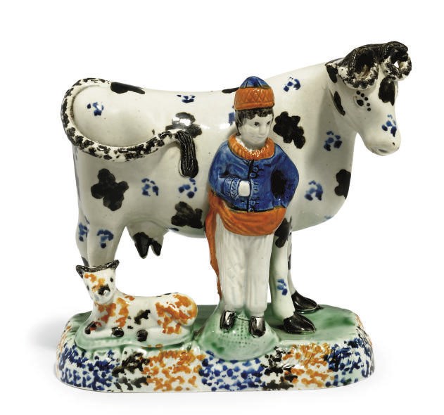 A PRATT WARE MODEL OF A COW, CALF AND COWHERD
