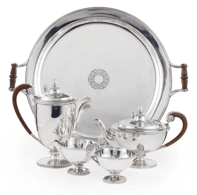 A FOUR-PIECE SILVER TEA SERVICE WITH ELECTROPLATED TWO-HANDLED TRAY EN SUITE