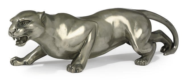 A SILVERED COMPOSITION MODEL OF A PANTHER