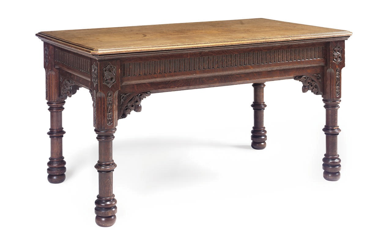 A VICTORIAN OAK CENTRE TABLE