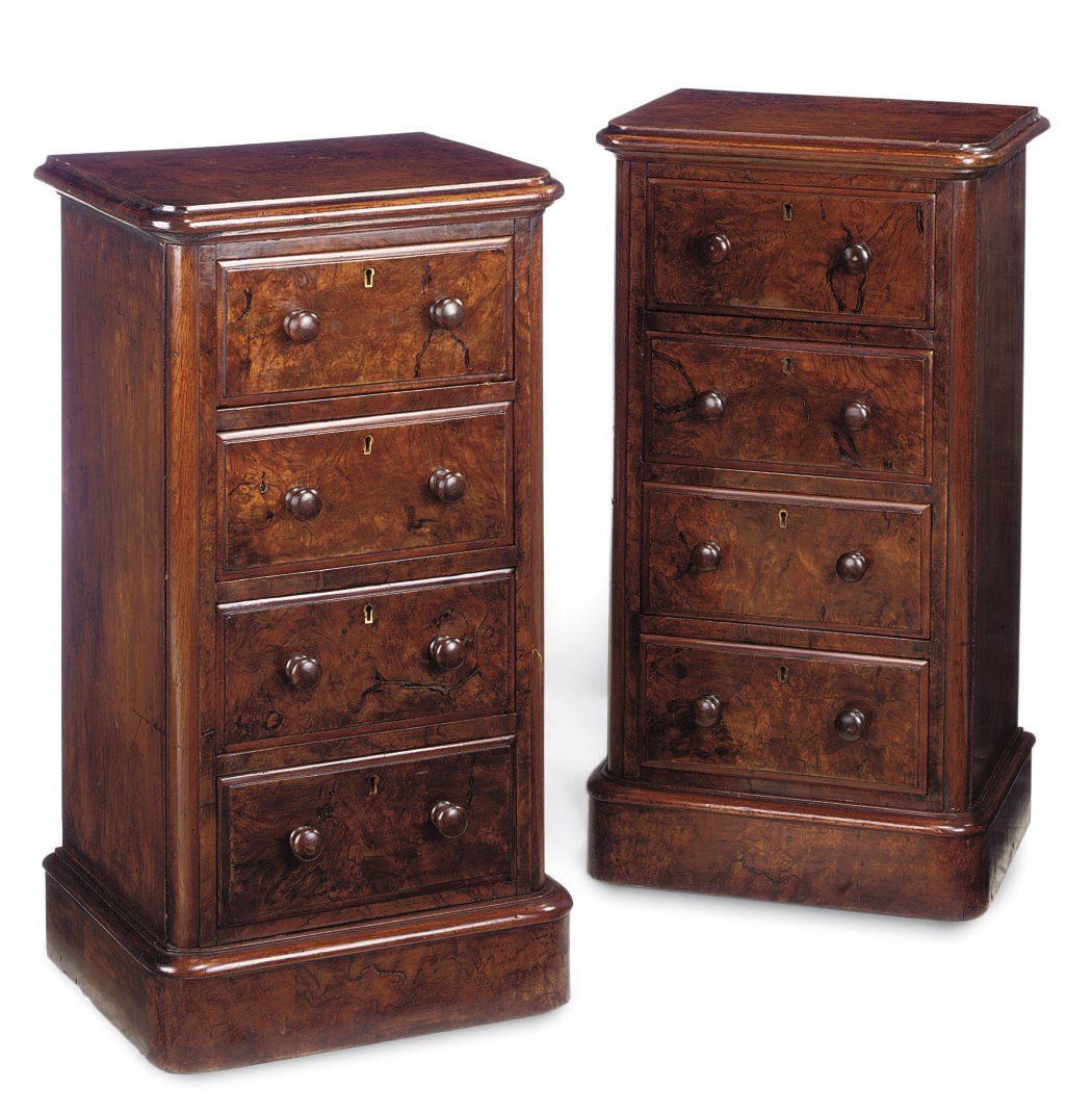 A PAIR OF WALNUT BEDSIDE CHESTS