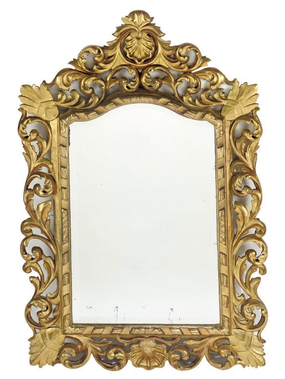 A FLORENTINE CARVED GILT WOOD WALL MIRROR