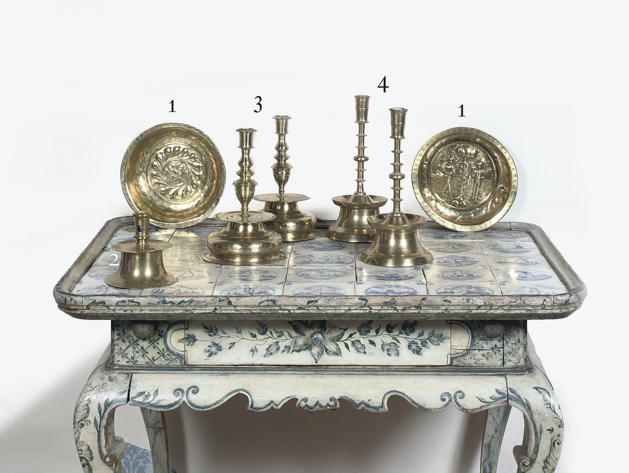 A PAIR OF NORTH EUROPEAN BRASS CANDLESTICKS