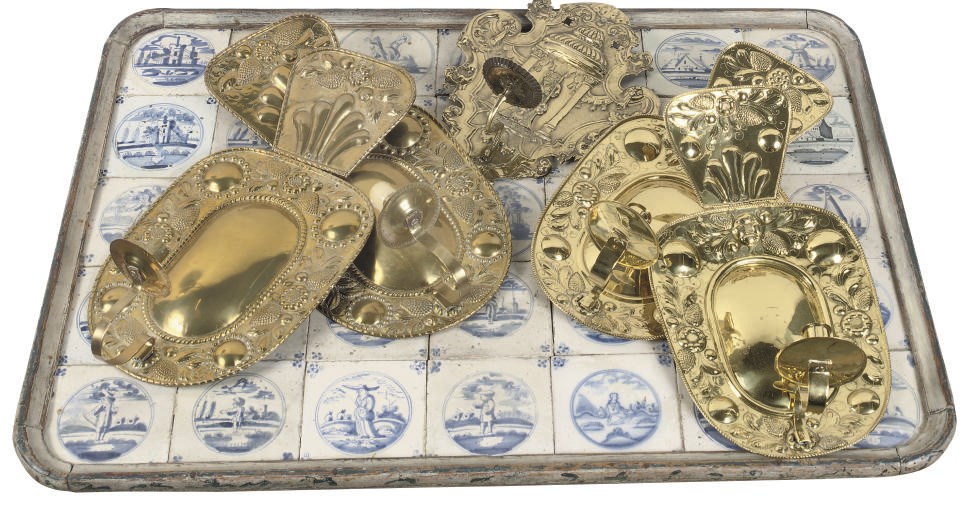 A PAIR OF DANISH BRASS REPOUSSE WALL SCONCES