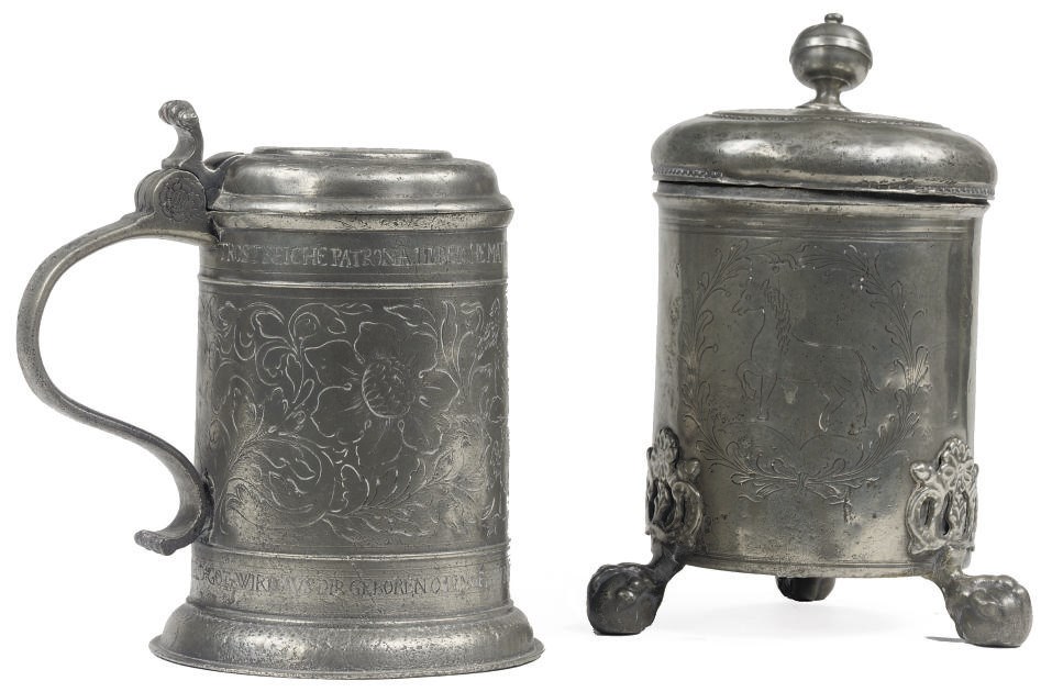 A GERMAN ENGRAVED PEWTER TANKARD