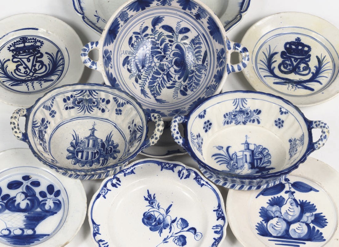 An assorted lot of Danish blue and white faience plates, a bowl and two baskets
