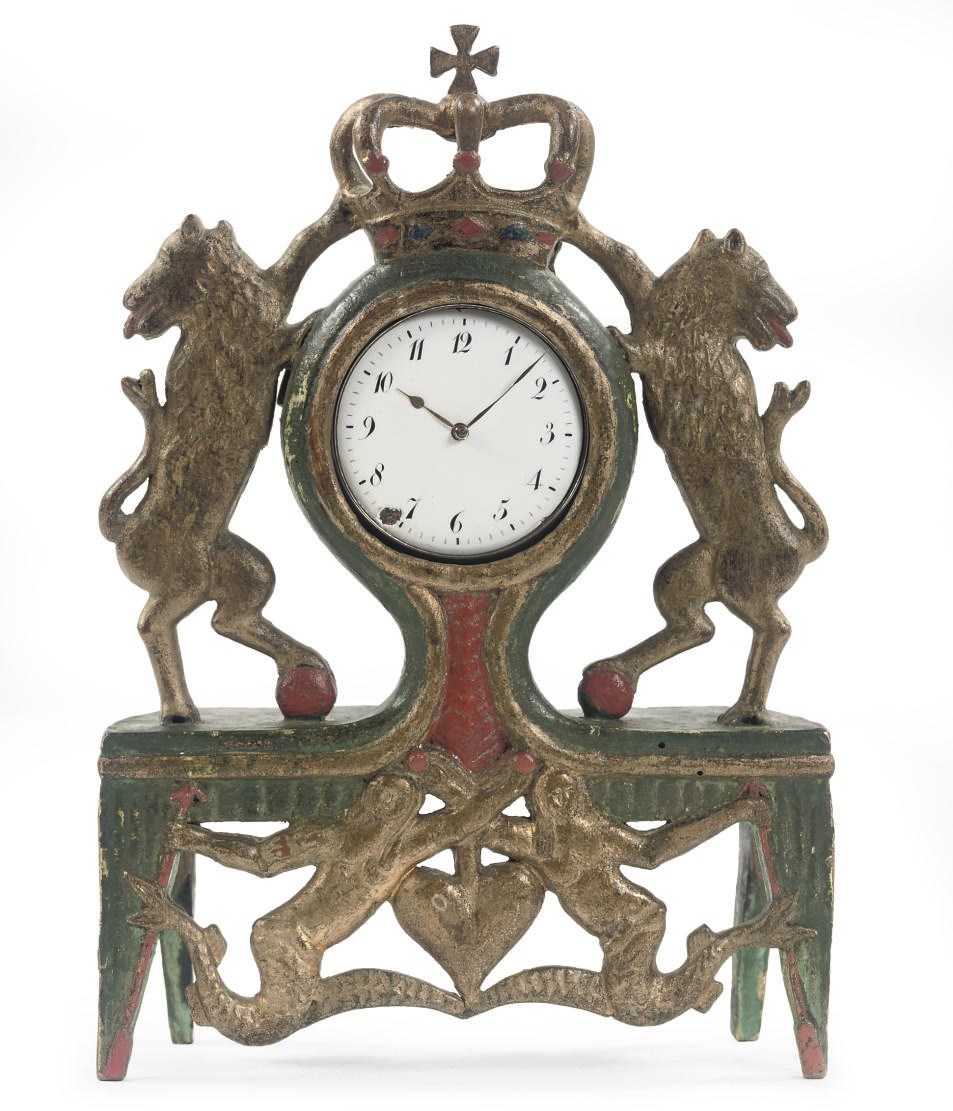 A POLYCHROME DECORATED AND PARCEL-GILT CARVED WOOD WATCH STAND