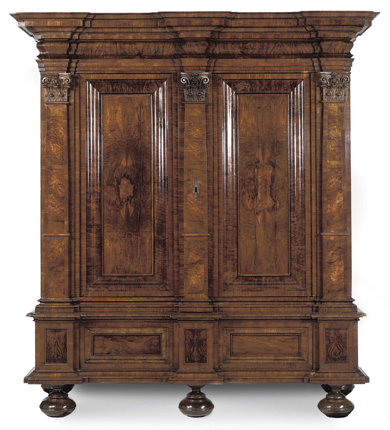 A GERMAN WALNUT AND FIGURED WALNUT CUPBOARD 'HALLENSCHRANK'