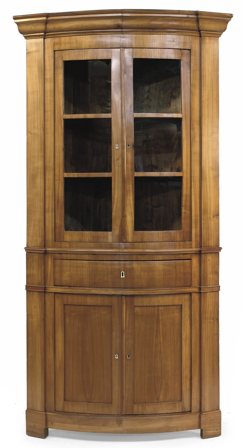 A GERMAN BIEDERMEIER CHERRYWOOD CORNER DISPLAY CABINET