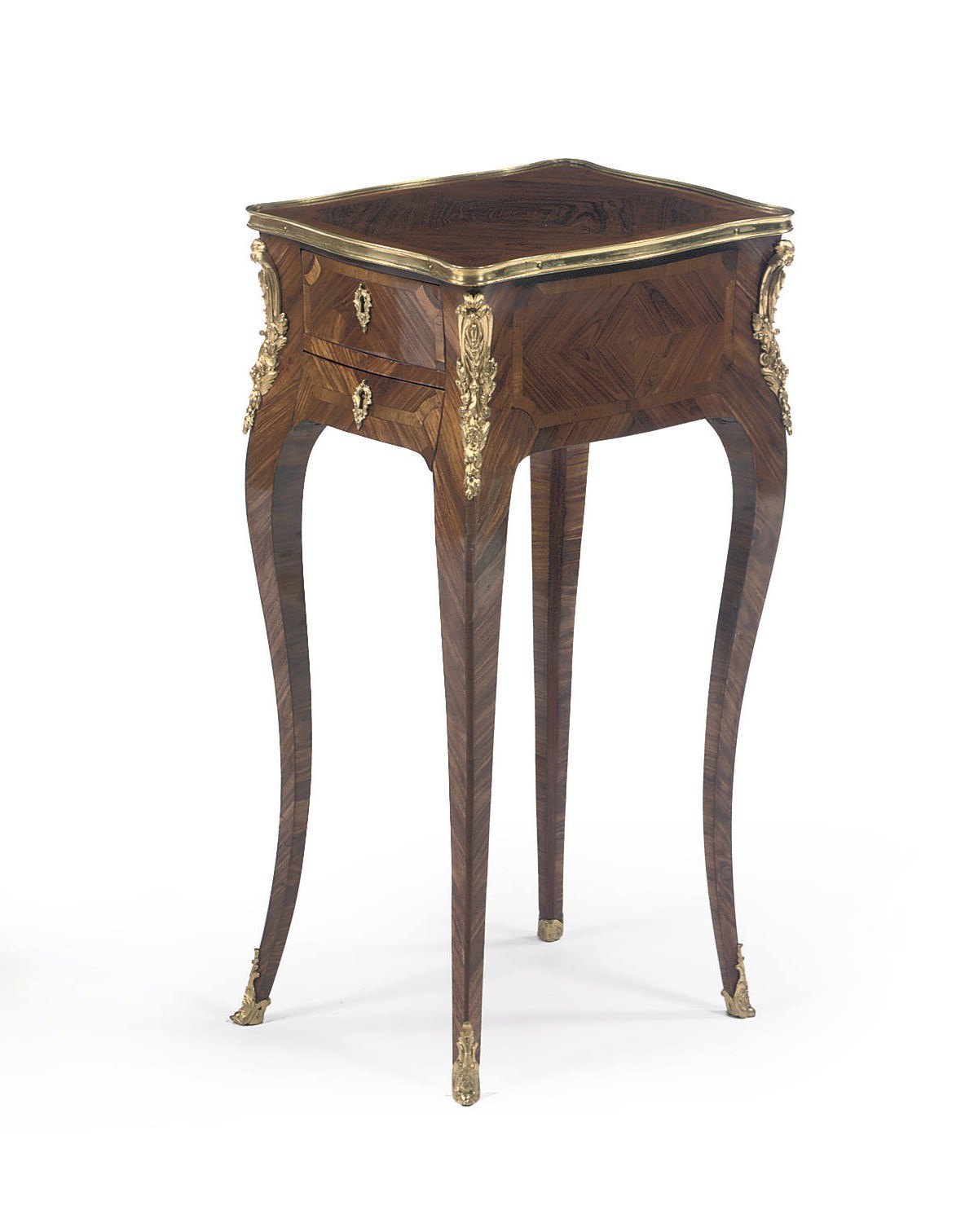 A LOUIS XV ORMOLU-MOUNTED AND BRASS-BANDED KINGWOOD, TULIPWOOD AND AMARANTH TABLE EN CHIFFONNIERE