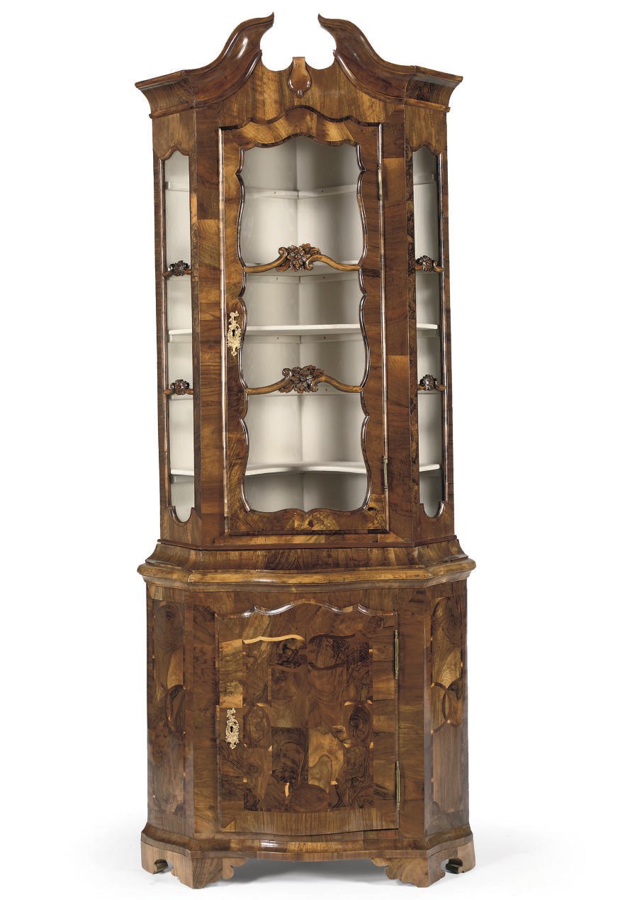 A GERMAN WALNUT, FIGURED WALNUT AND FRUITWOOD CORNER DISPLAY CUPBOARD