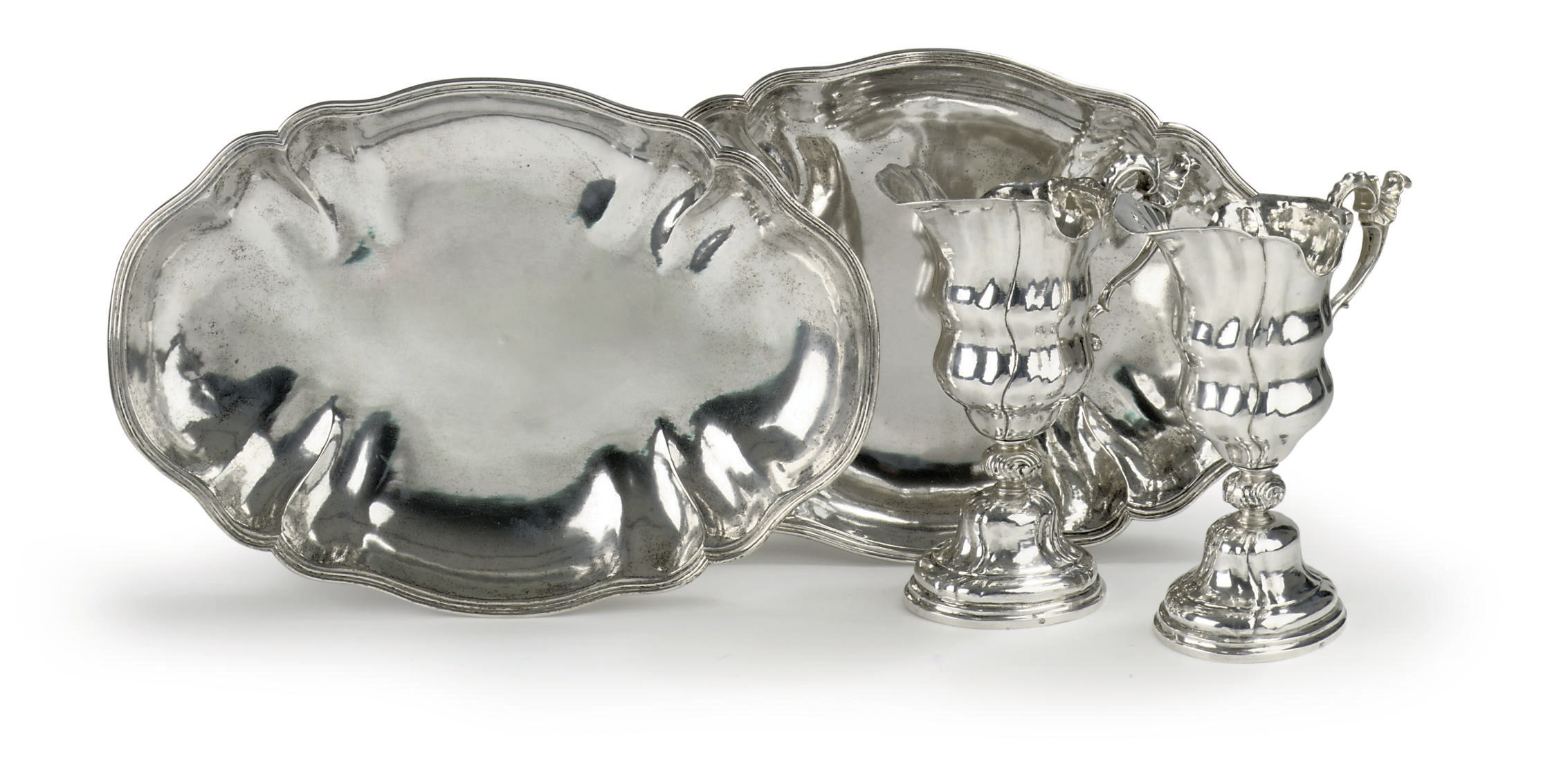 A pair of German silver ewers and stands