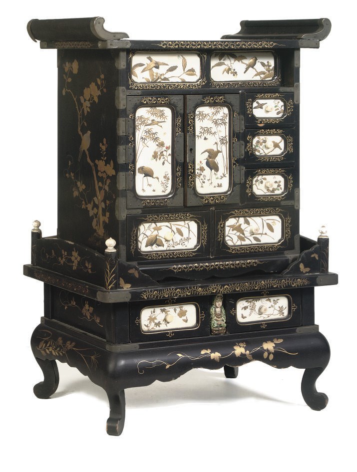 A JAPANESE EXPORT BLACK LAQUER, SHIBAYAMA-STYLE MINIATURE CABINET-ON-STAND