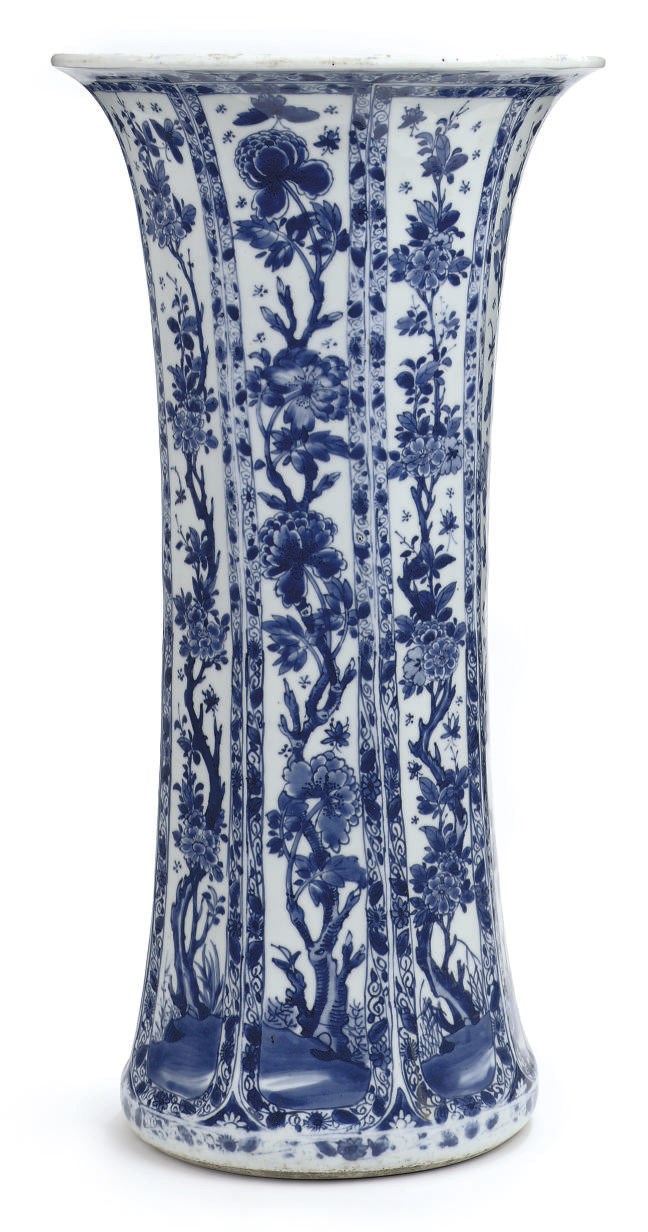 A large Chinese blue and white beaker vase