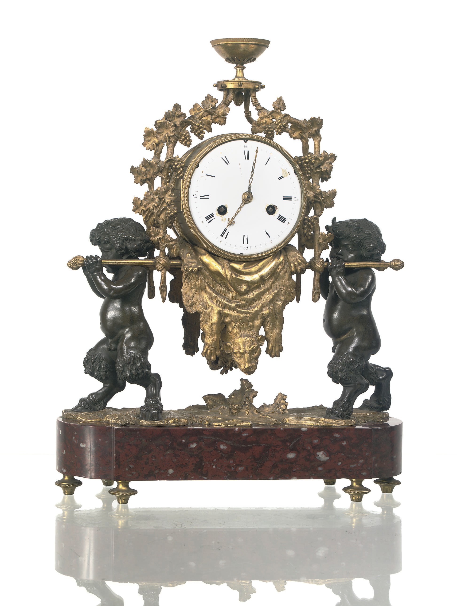 A LATE LOUIS XVI ORMOLU, PATINATED BRONZE AND ROUGE-GRIOTTE MARBLE FIGURAL STRIKING MANTEL CLOCK