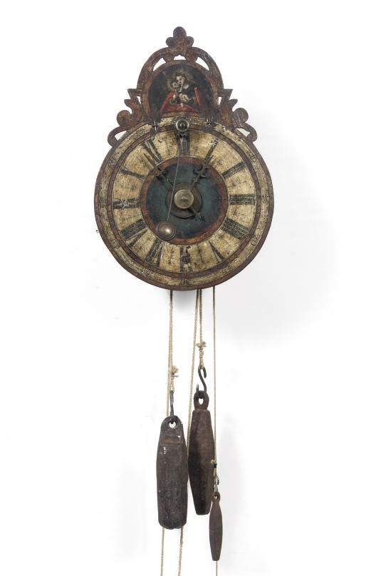 A GERMAN POLYCHROME PAINTED STRIKING ZAPPLER WALL CLOCK