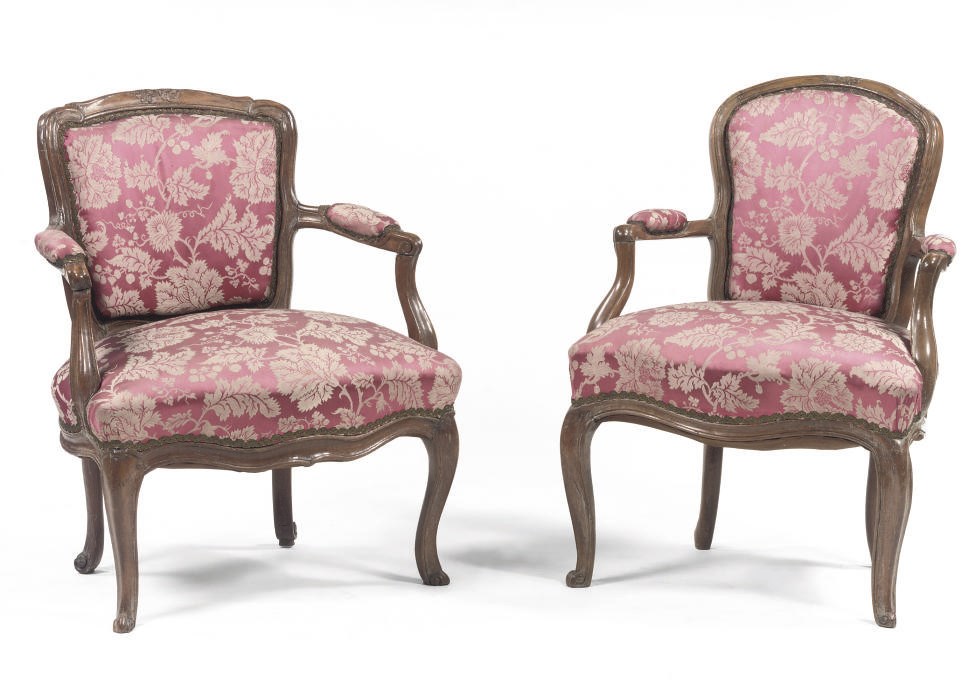 TWO GERMAN WALNUT ARMCHAIRS