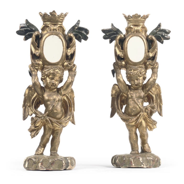 A PAIR OF ITALIAN GILT AND POLYCHROME CARVED WOOD FIGURAL RELIQUARY STAND