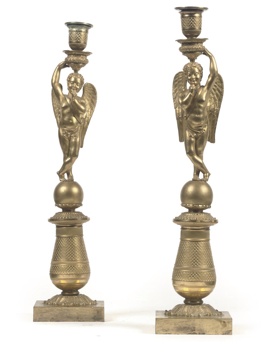 A PAIR OF EMPIRE ORMOLU FIGURAL CANDLESTICKS