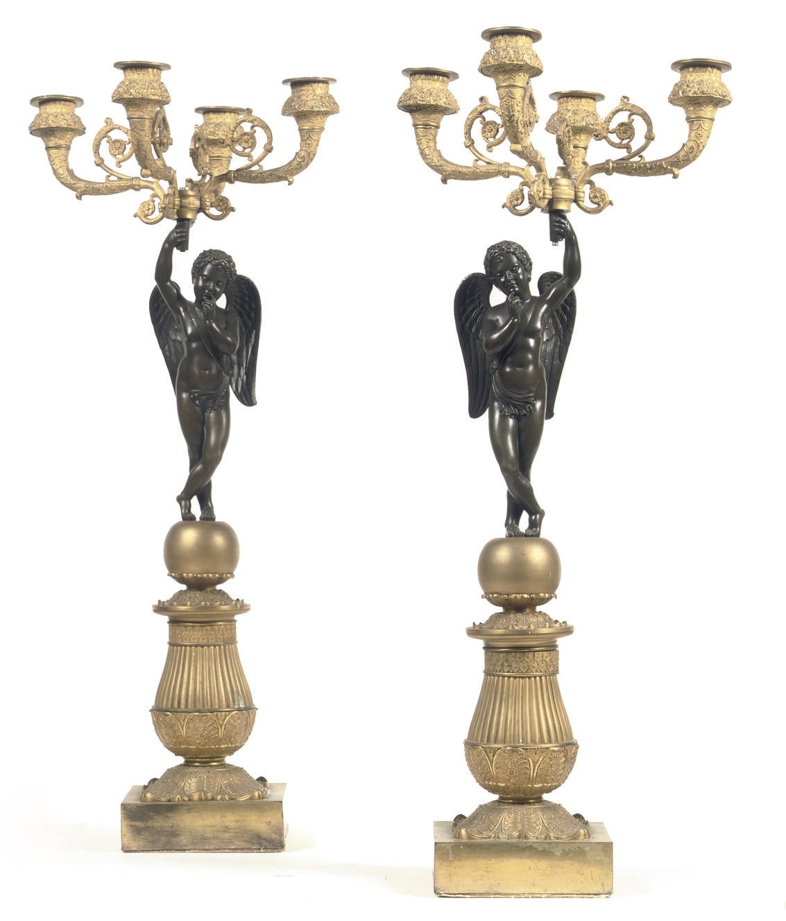 A PAIR OF RESTAURATION ORMOLU AND PATINATED BRONZE FIGURAL FOUR-LIGHT CANDELABRA