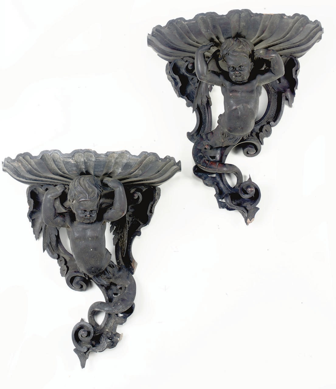 A SET OF SIX GERMAN STAINED WOOD WALL BRACKETS
