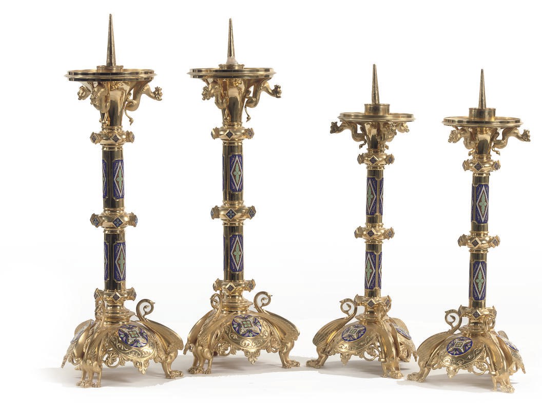 A PAIR OF NORTH GERMAN ORMOLU AND CLOISSONE NEO-GOTHIC PRICKET CANDLE STICKS