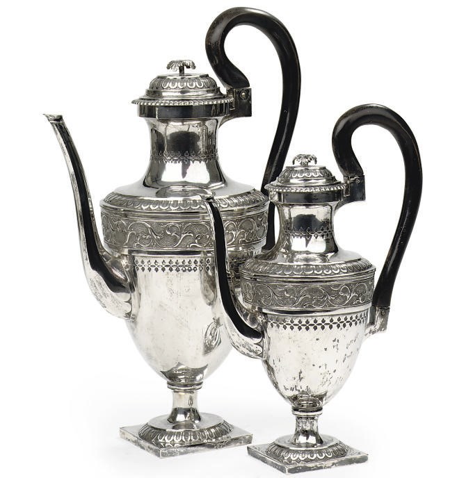 Two German silver coffee pots in sizes