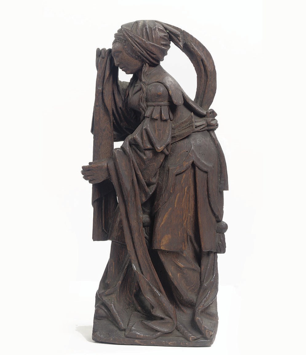 A CARVED OAK FIGURE OF MARY MAGDALENE