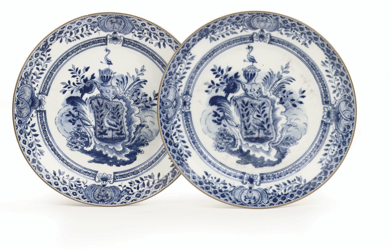 A pair of Chinese blue and white armorial plates for the Swedish market