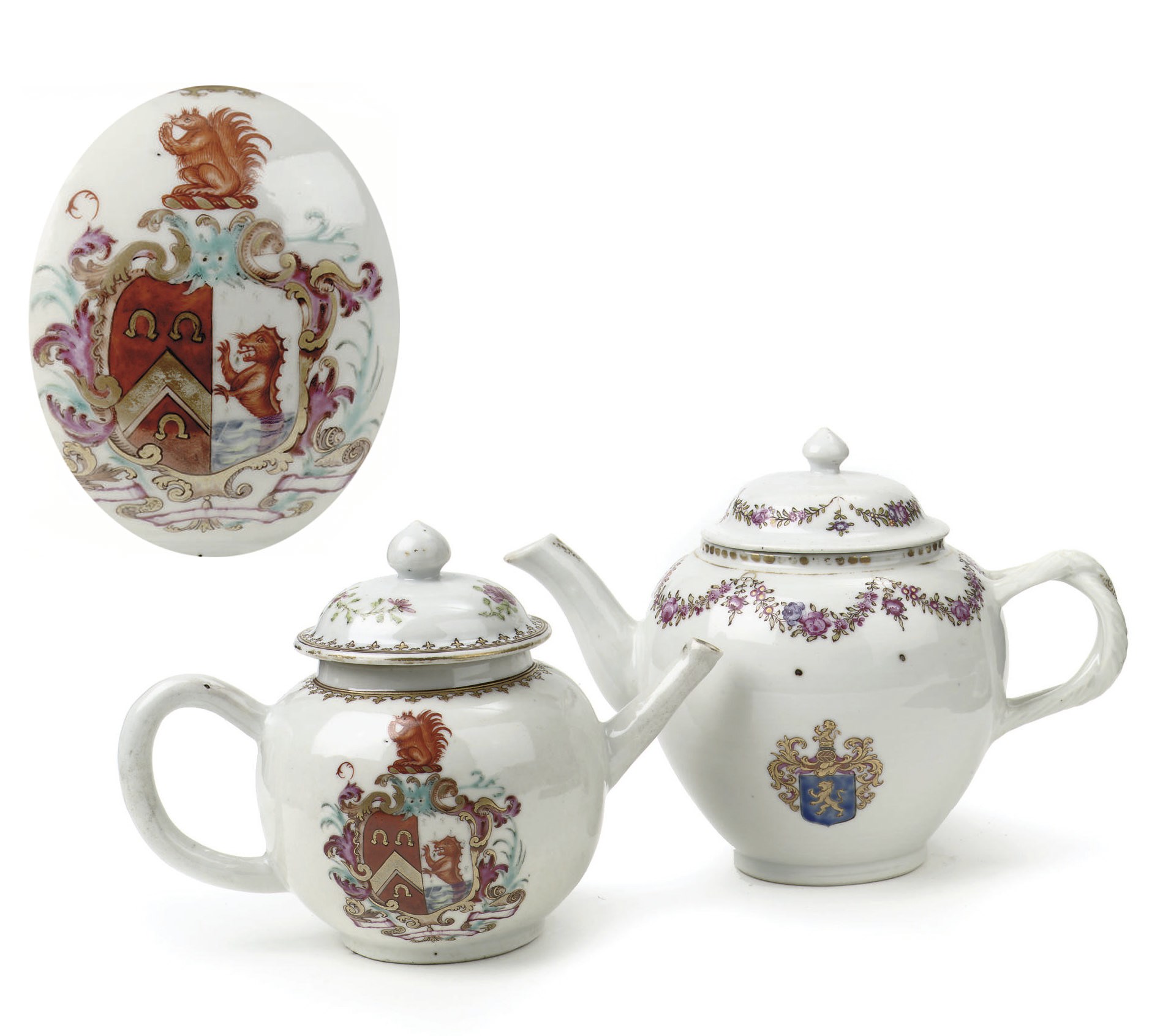 Two Chinese armorial teapots and associated covers for the English market