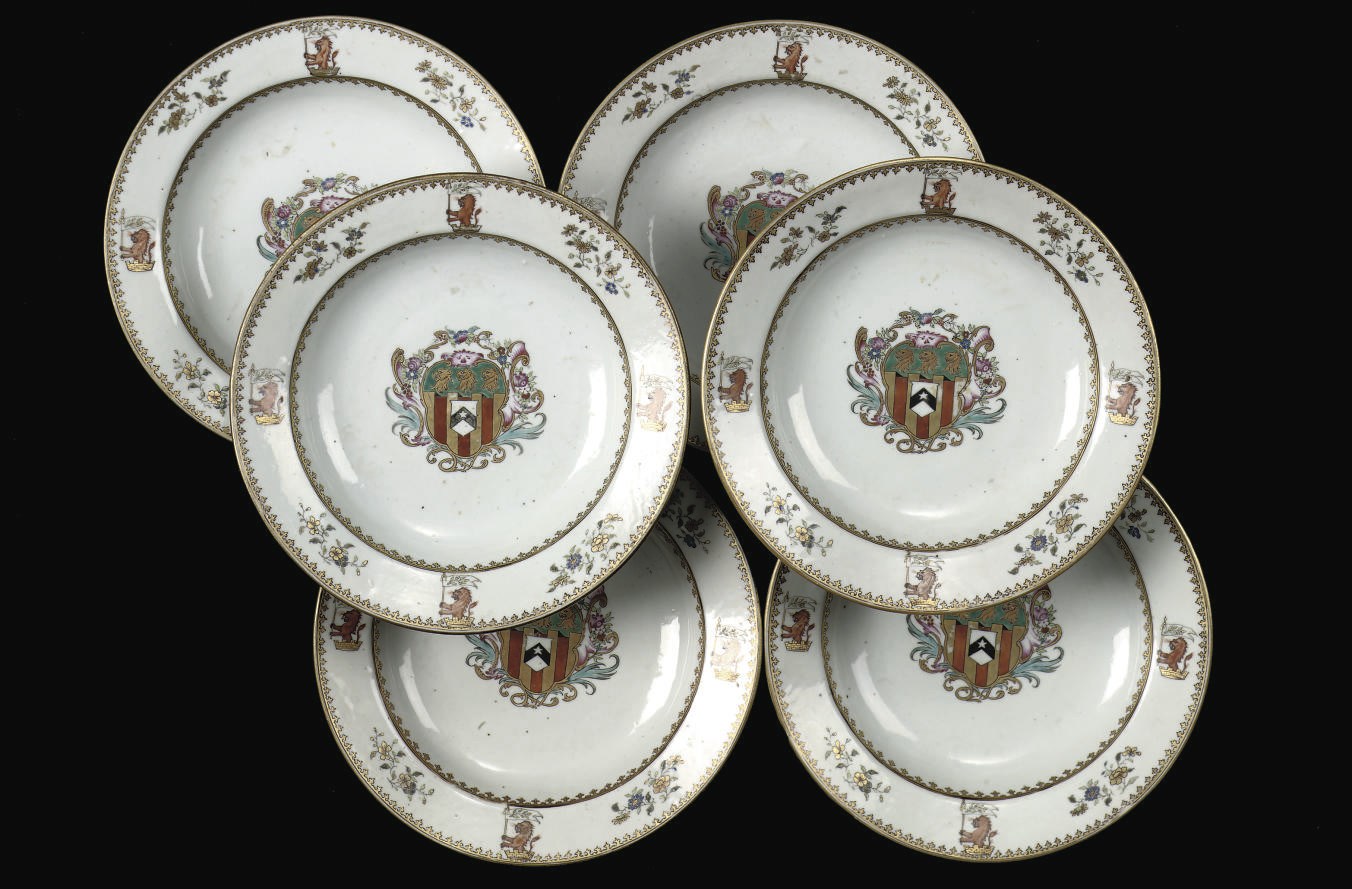 A set of six Chinese famille rose armorial soup-plates for the English market