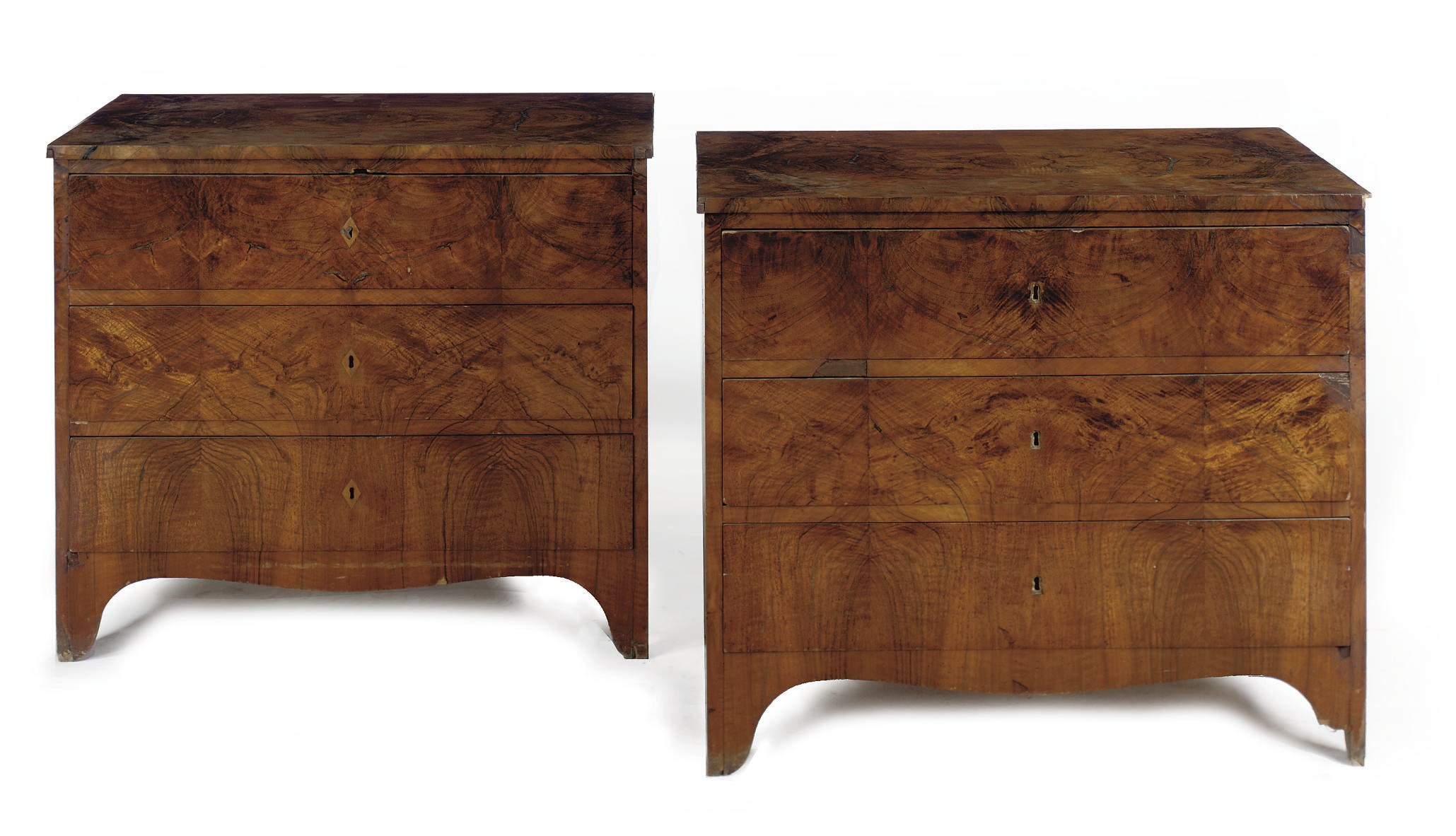 A PAIR OF SOUTH WEST GERMAN BIEDERMEIER FIGURED-WALNUT COMMODES