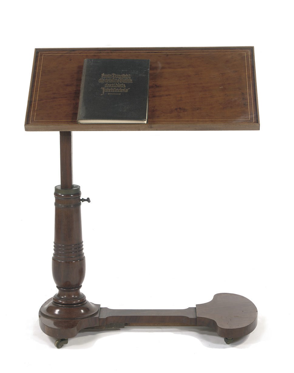 A GERMAN BIEDERMEIER MAHOGANY BED-SIDE TABLE