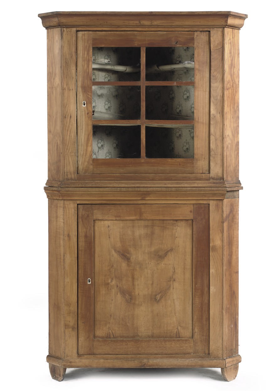 A GERMAN CHERRYWOOD CORNER CUPBOARD