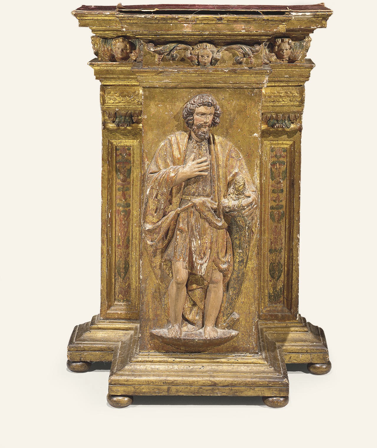 PIEDESTAL EN BOIS SCULPTE, PEINT POLYCHROME ET PARTIELLEMENT DORE