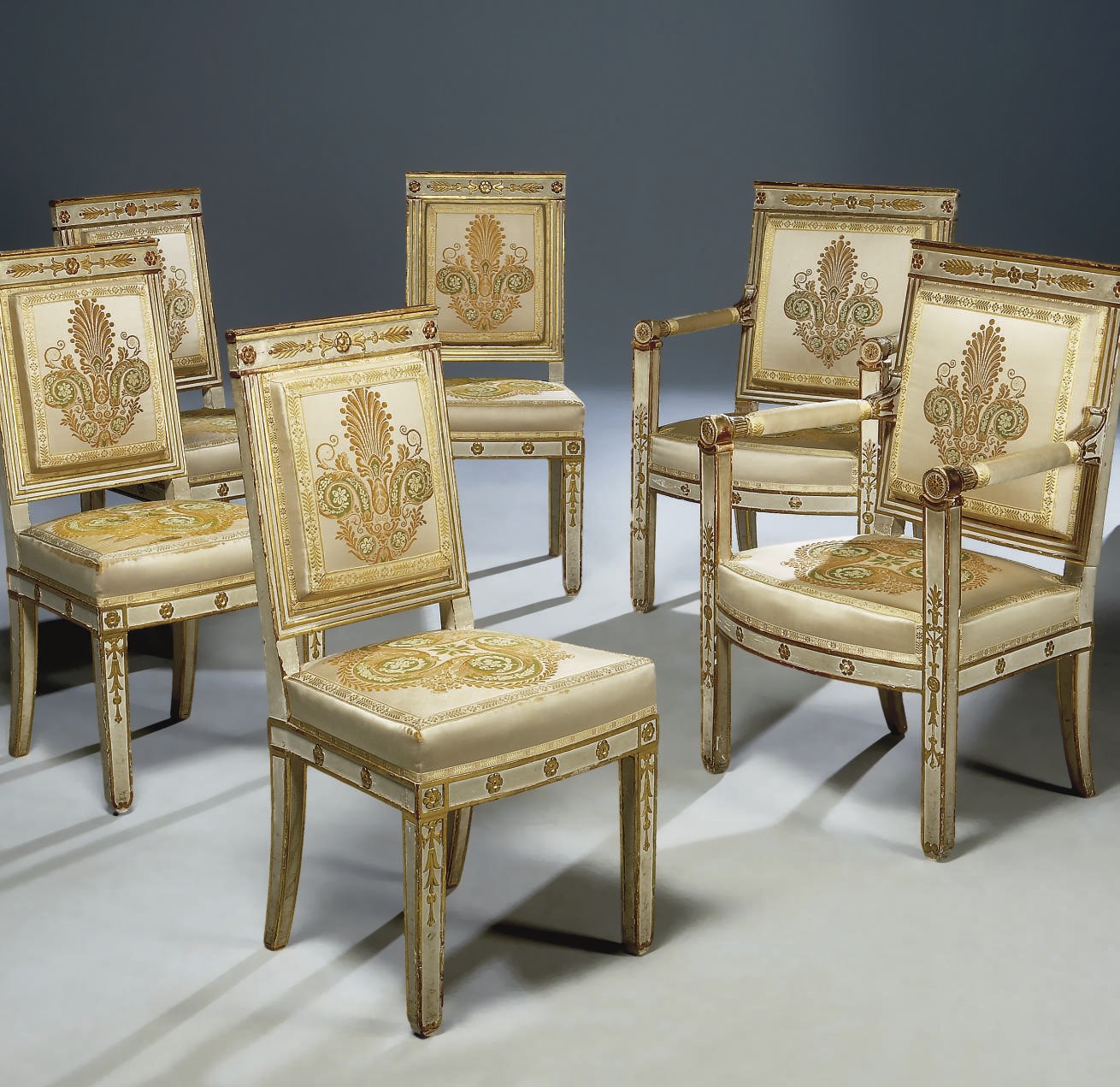 SUITE COMPRENANT QUATRE CHAISES ET DEUX FAUTEUILS D'EPOQUE EMPIRE