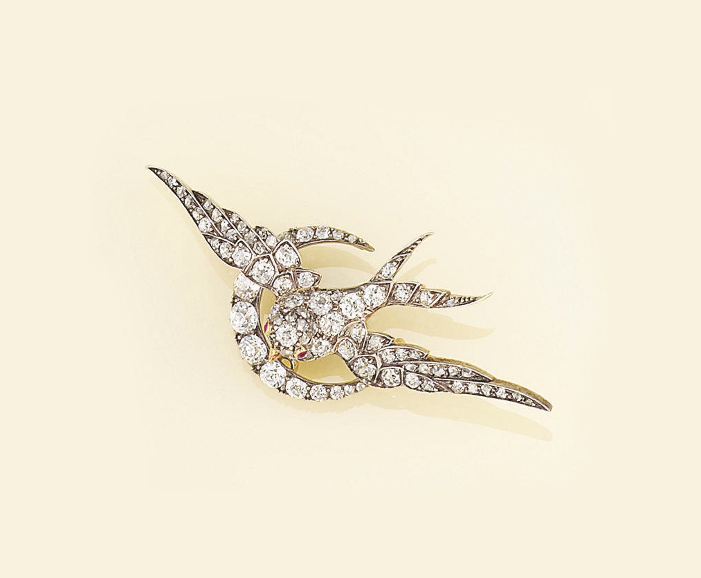 A Victorian diamond bird brooch