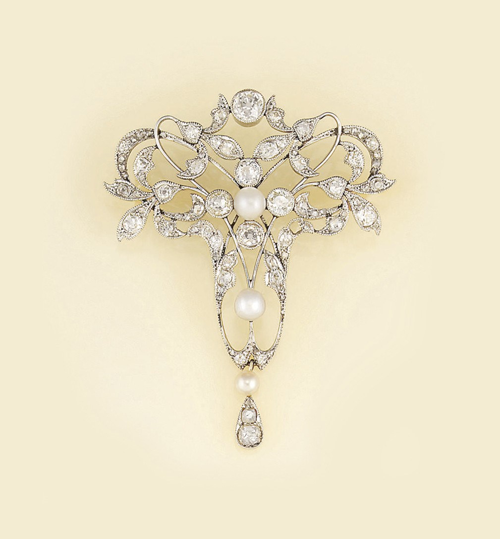 A French Art Nouveau diamond and pearl brooch