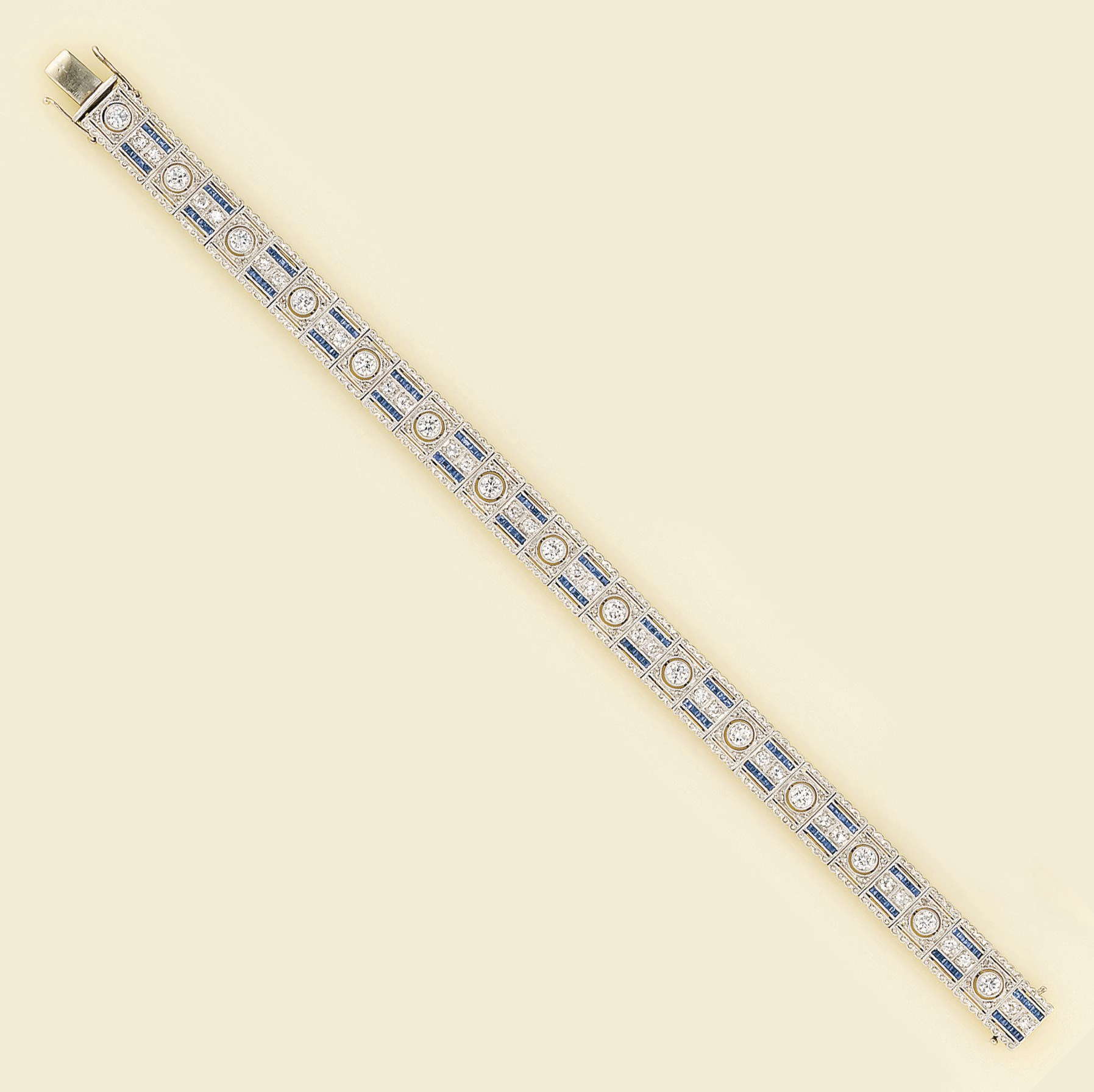 An Art Deco diamond and sapphire flexible bracelet