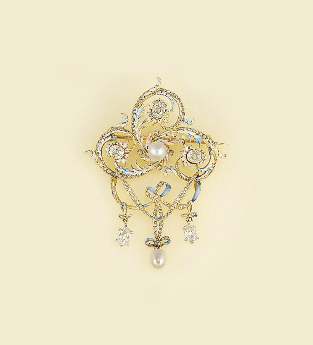 A French diamond and enamel brooch